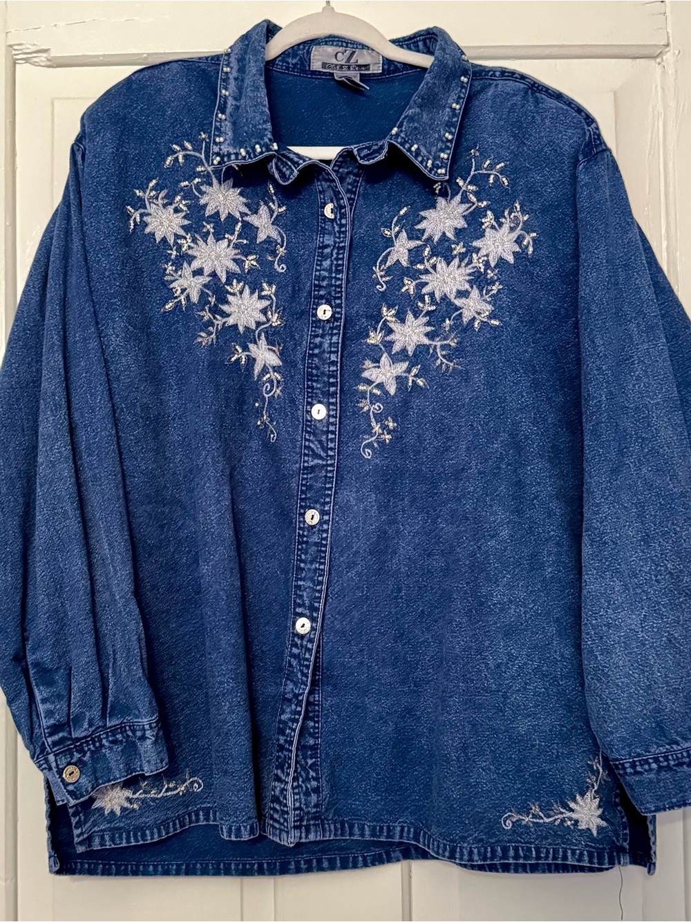 cZ Women’s Dark Blue Denim Button Up with floral embroidery and pearl detail